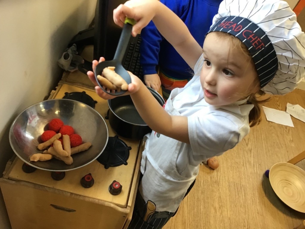 SW Owls Cooking AB A happy child, smiling.