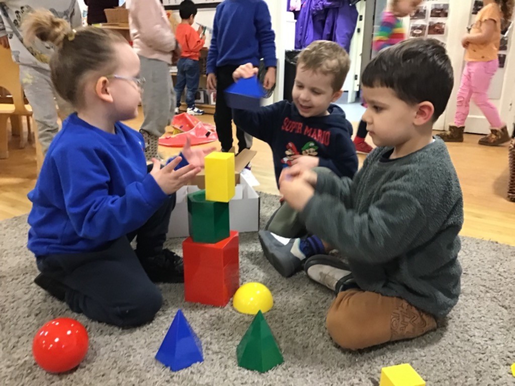 SW Owls shape building A happy child, smiling.